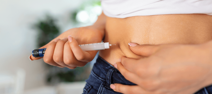 A girl taking Insulin Injection due to Diabetes